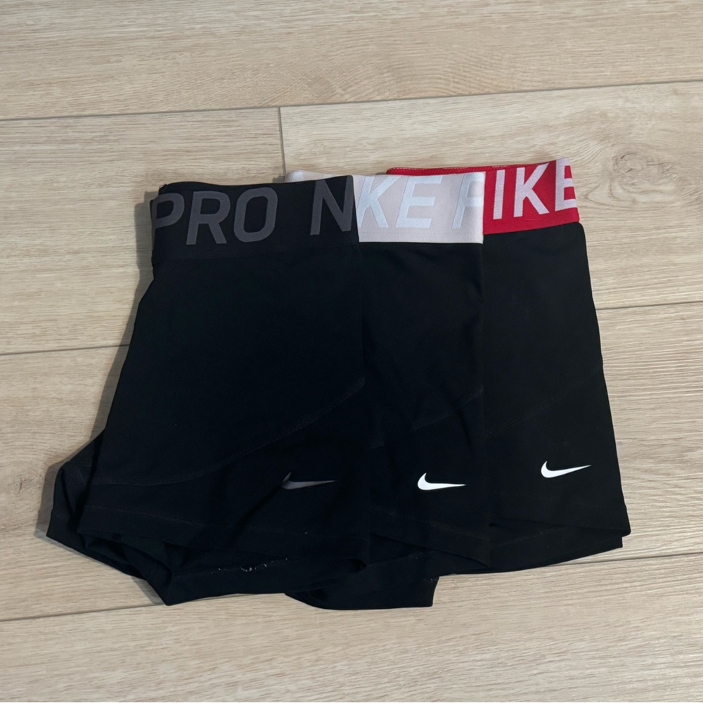 3 Nike Pros all small